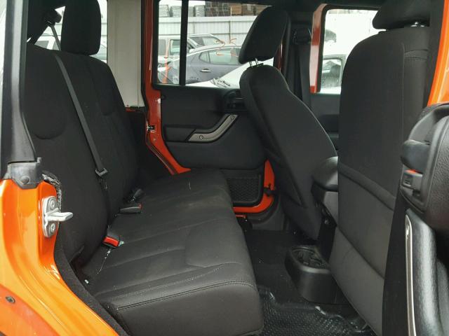 1C4BJWDGXFL599464 - 2015 JEEP WRANGLER U ORANGE photo 6