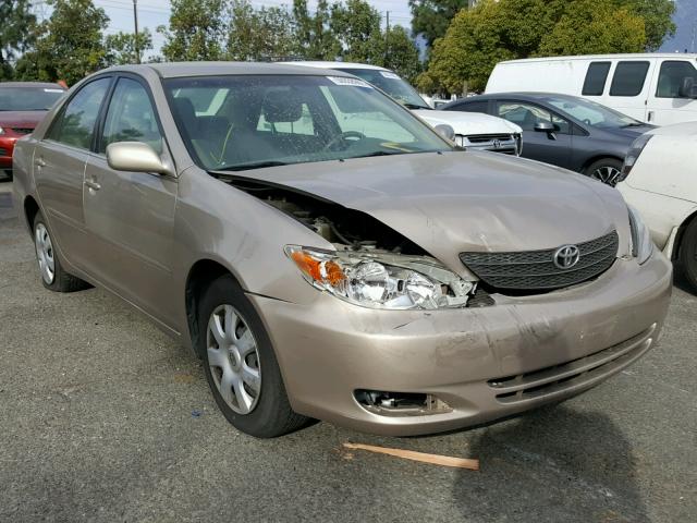 JTDBE32K440268453 - 2004 TOYOTA CAMRY LE GOLD photo 1