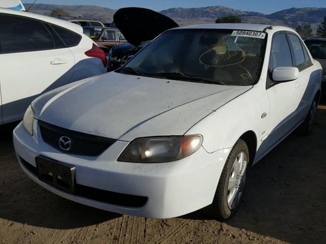 JM1BJ225021620936 - 2002 MAZDA PROTEGE DX WHITE photo 2