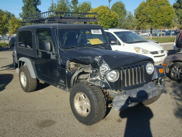 1J4FA49S64P768267 - 2004 JEEP WRANGLER / BLACK photo 1