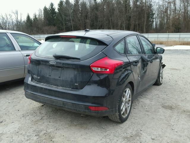 1FADP3K26FL217210 - 2015 FORD FOCUS SE BLACK photo 4