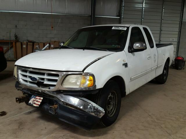 1FTRX17WXXNA00636 - 1999 FORD F150 WHITE photo 2