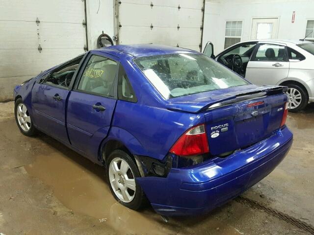 1FAFP34NX5W126485 - 2005 FORD FOCUS ZX4 BLUE photo 3