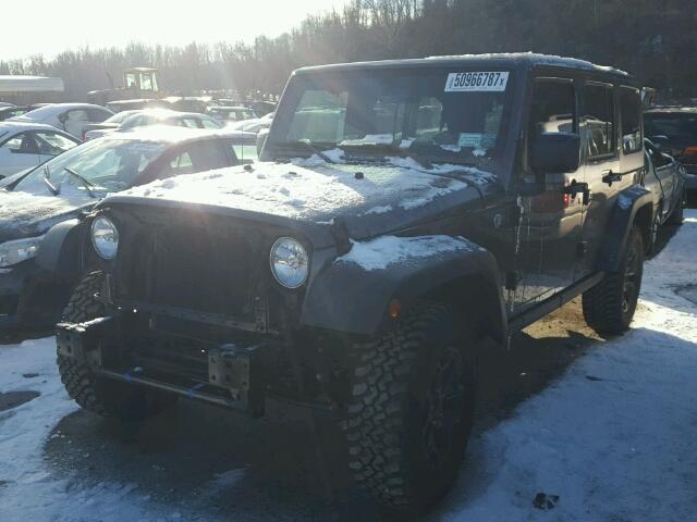 1C4BJWDG3GL314587 - 2016 JEEP WRANGLER U GRAY photo 2