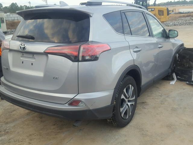 2T3ZFREV6HW351579 - 2017 TOYOTA RAV4 LE SILVER photo 4