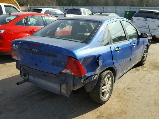 1FAFP34P53W159506 - 2003 FORD FOCUS SE BLUE photo 4