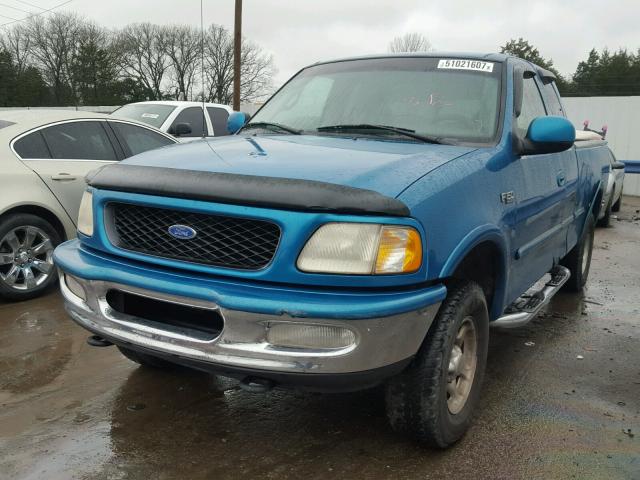 1FTDX18W1VNC46688 - 1997 FORD F150 TEAL photo 2