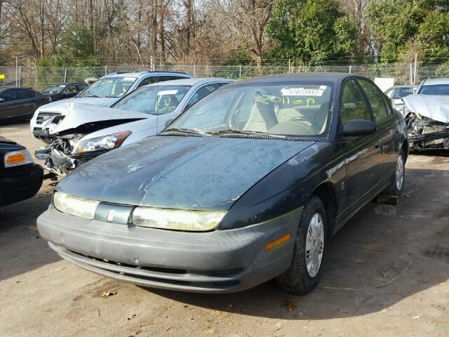 1G8ZG5284XZ359600 - 1999 SATURN SL1 GREEN photo 2