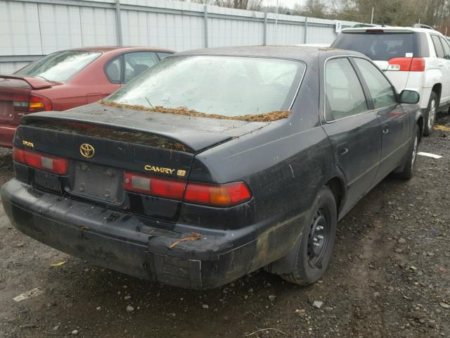 JT2BG22K5X0282539 - 1999 TOYOTA CAMRY LE BLACK photo 4