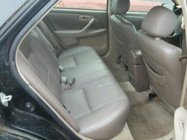 JT2BG22K5X0282539 - 1999 TOYOTA CAMRY LE BLACK photo 6