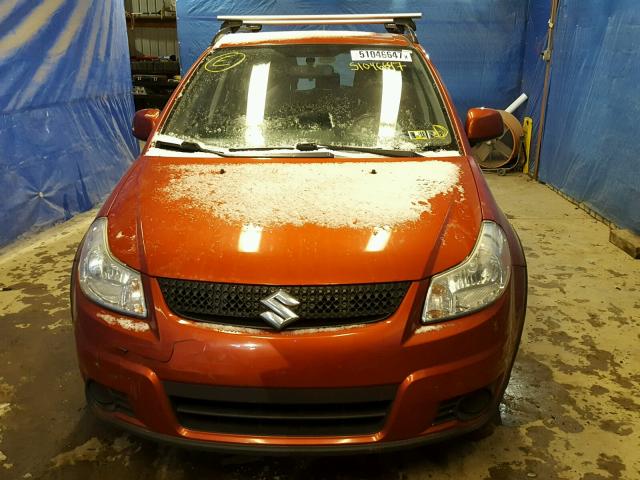 JS2YB5A39B6300273 - 2011 SUZUKI SX4 BASE ORANGE photo 9