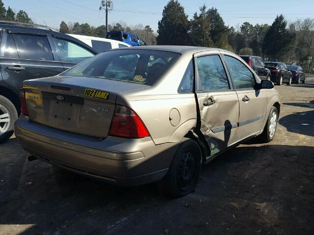 1FAFP34N55W104863 - 2005 FORD FOCUS ZX4 TAN photo 4