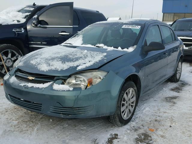 1G1AS58H597232645 - 2009 CHEVROLET COBALT LS GREEN photo 2