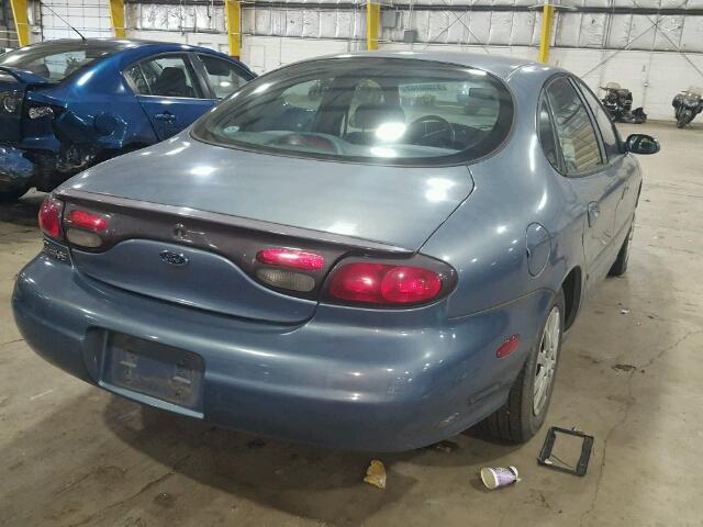 1FAFP53UXXG142980 - 1999 FORD TAURUS SE BLUE photo 4