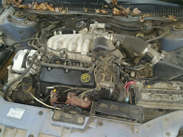 1FAFP53UXXG142980 - 1999 FORD TAURUS SE BLUE photo 7