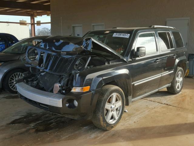 1J4NT4GB4AD625825 - 2010 JEEP PATRIOT LI BLACK photo 2