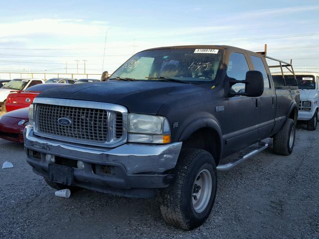 1FTSW31S82EC37995 - 2002 FORD F350 SRW S BLACK photo 2