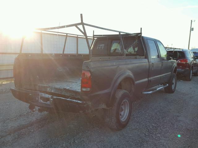 1FTSW31S82EC37995 - 2002 FORD F350 SRW S BLACK photo 4