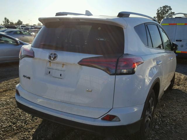 2T3ZFREV4GW245047 - 2016 TOYOTA RAV4 LE WHITE photo 4