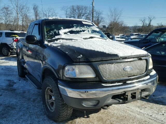 2FTRX08L7XCA00520 - 1999 FORD F150 BLACK photo 1