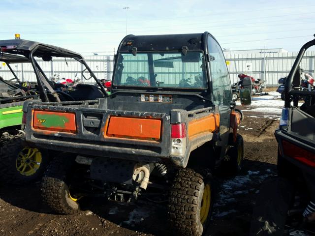 1M0825GSCBM026700 - 2011 JOHN DEERE GATOR ORANGE photo 4