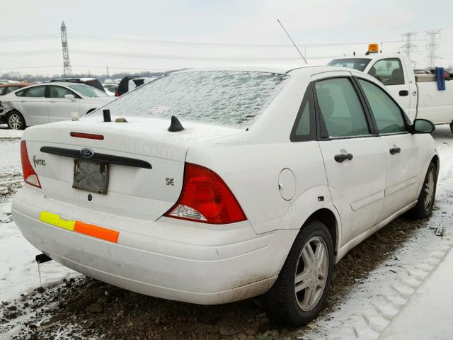 1FAFP34P51W266858 - 2001 FORD FOCUS SE WHITE photo 4