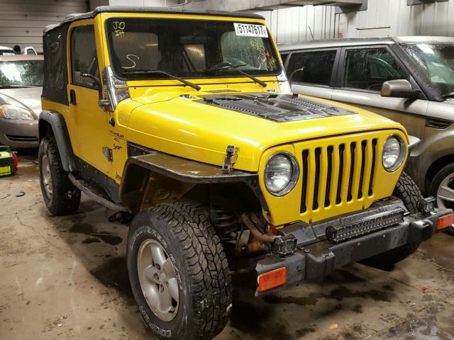 1J4FA49S5YP710382 - 2000 JEEP WRANGLER / YELLOW photo 1