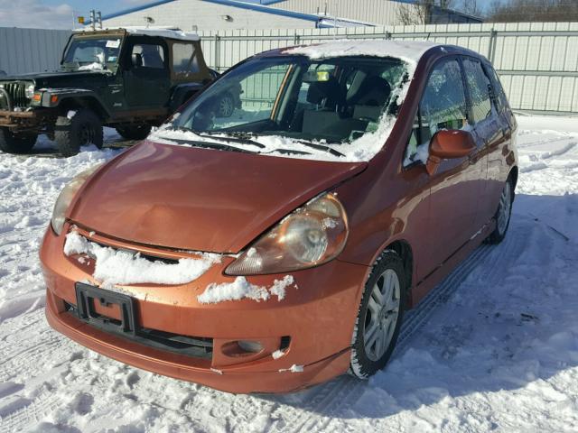 JHMGD37678S056076 - 2008 HONDA FIT SPORT ORANGE photo 2