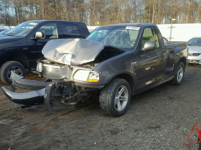 2FTRF07343CA41931 - 2003 FORD F150 SVT L GRAY photo 2