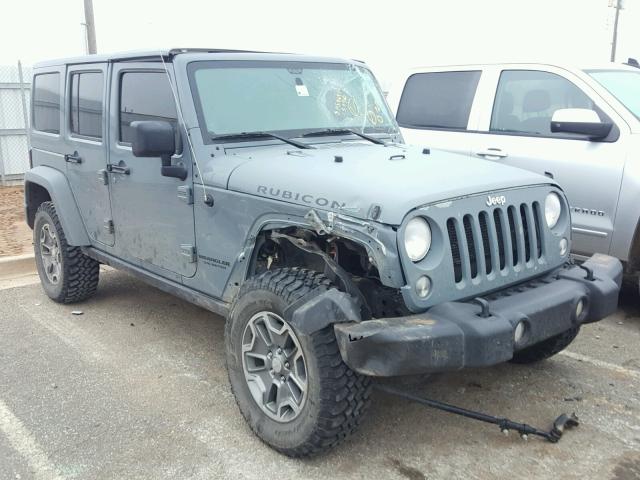 1C4HJWFG3EL157910 - 2014 JEEP WRANGLER U GRAY photo 1