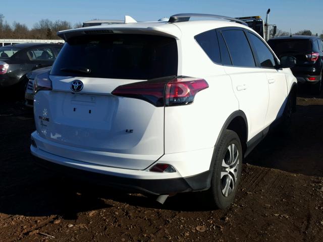 2T3ZFREVXHW335224 - 2017 TOYOTA RAV4 LE WHITE photo 4