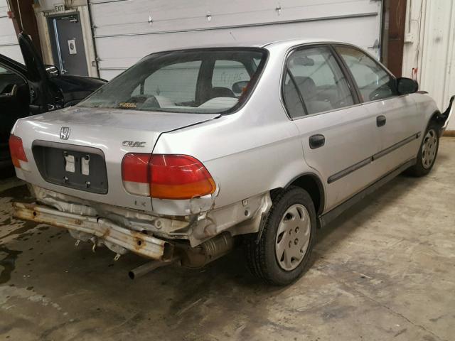 1HGEJ6675VL028555 - 1997 HONDA CIVIC LX SILVER photo 4