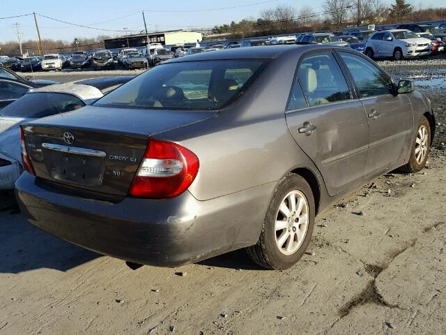 4T1BF30K34U572975 - 2004 TOYOTA CAMRY LE ნაცრისფერი ფოტო 4