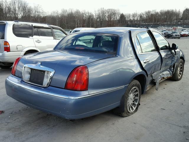 1LNHM82W4YY799975 - 2000 LINCOLN TOWN CAR S BLUE photo 4