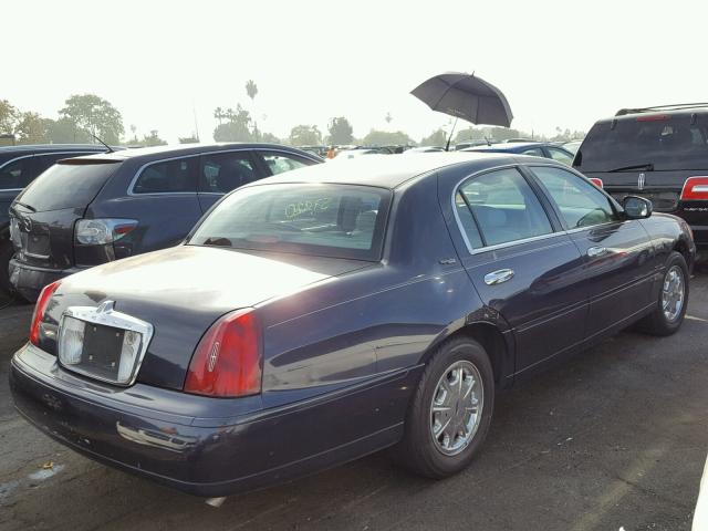 1LNHM82W0XY626307 - 1999 LINCOLN TOWN CAR S BLUE photo 4