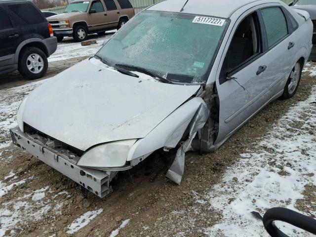 1FAHP34N07W274155 - 2007 FORD FOCUS ZX4 SILVER photo 9