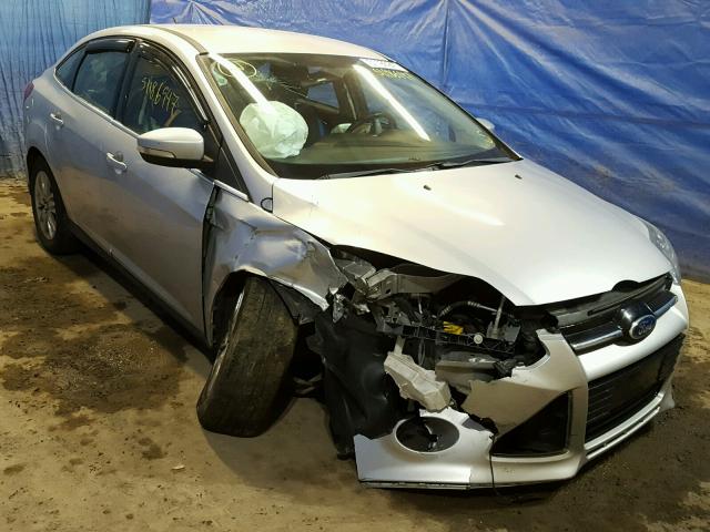 1FAHP3H28CL191780 - 2012 FORD FOCUS SEL SILVER photo 1