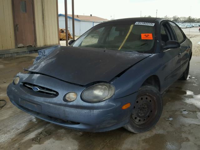 1FAFP52U7XG186453 - 1999 FORD TAURUS LX BLUE photo 2