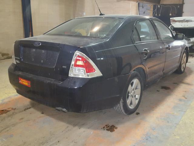 3FAHP07Z59R172000 - 2009 FORD FUSION SE BLUE photo 4