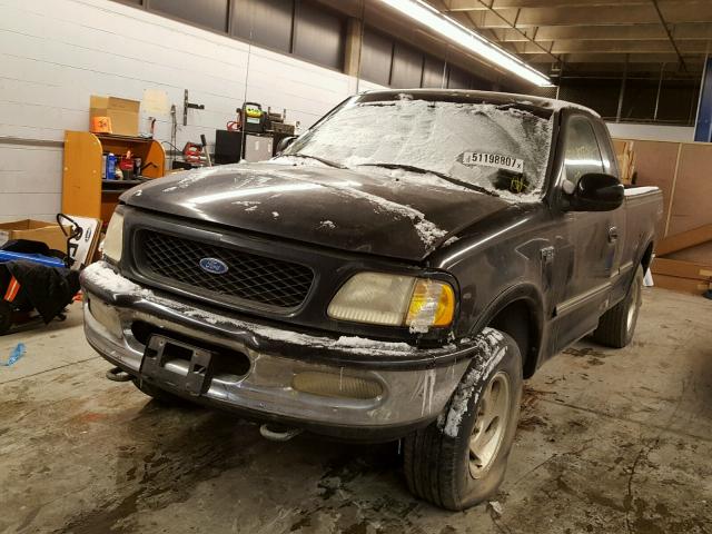 1FTDX1869VKA08914 - 1997 FORD F150 BLACK photo 2