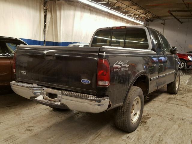 1FTDX1869VKA08914 - 1997 FORD F150 BLACK photo 4