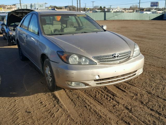 JTDBF30K720044672 - 2002 TOYOTA CAMRY LE GOLD photo 1