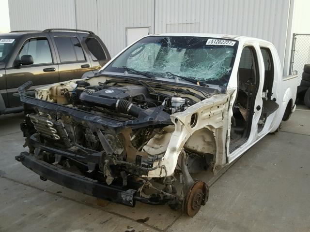 1N6AD07U05C402296 - 2005 NISSAN FRONTIER C WHITE photo 2