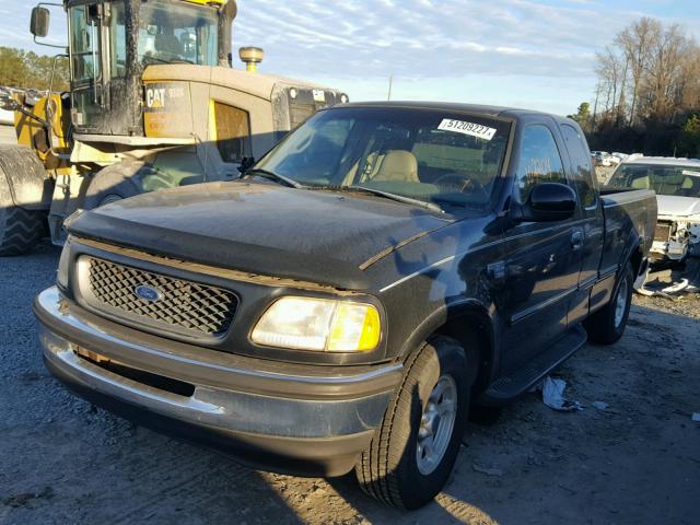 1FTZX1769WNB30888 - 1998 FORD F150 BLACK photo 2