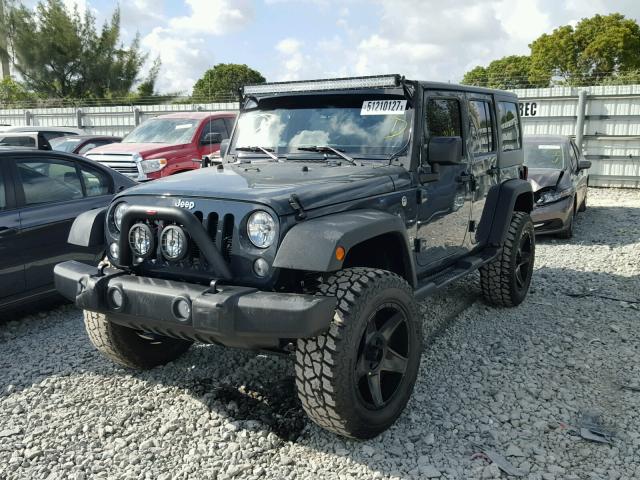 1C4BJWDG2HL512577 - 2017 JEEP WRANGLER U GRAY photo 2