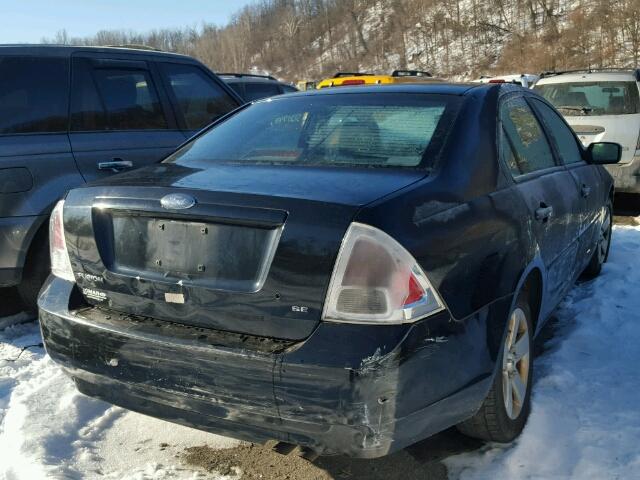 3FAFP07Z06R162834 - 2006 FORD FUSION SE BLACK photo 4