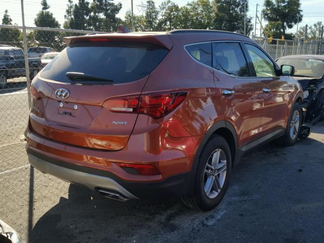 5XYZU3LB2HG492515 - 2017 HYUNDAI SANTA FE S ORANGE photo 4