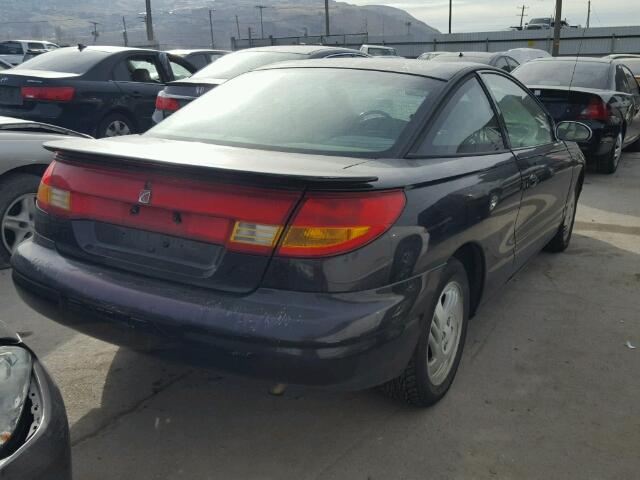 1G8ZY1279YZ108585 - 2000 SATURN SC2 BLACK photo 4