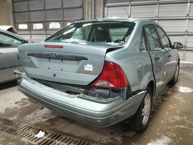 1FAFP34P83W124278 - 2003 FORD FOCUS SE GREEN photo 4