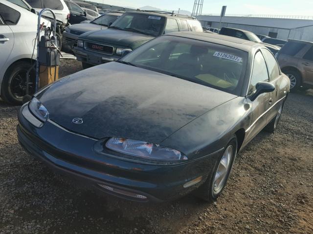 1G3GR62C6X4117275 - 1999 OLDSMOBILE AURORA GREEN photo 2